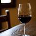 A glass of red wine on a table inside the Paesano restaurant and wine bar on Friday. Owner Michael Roddy says the decor and food has a lot of italian influence. Roddy has been to Italy 14 times. Daniel Brenner I AnnArbor.com